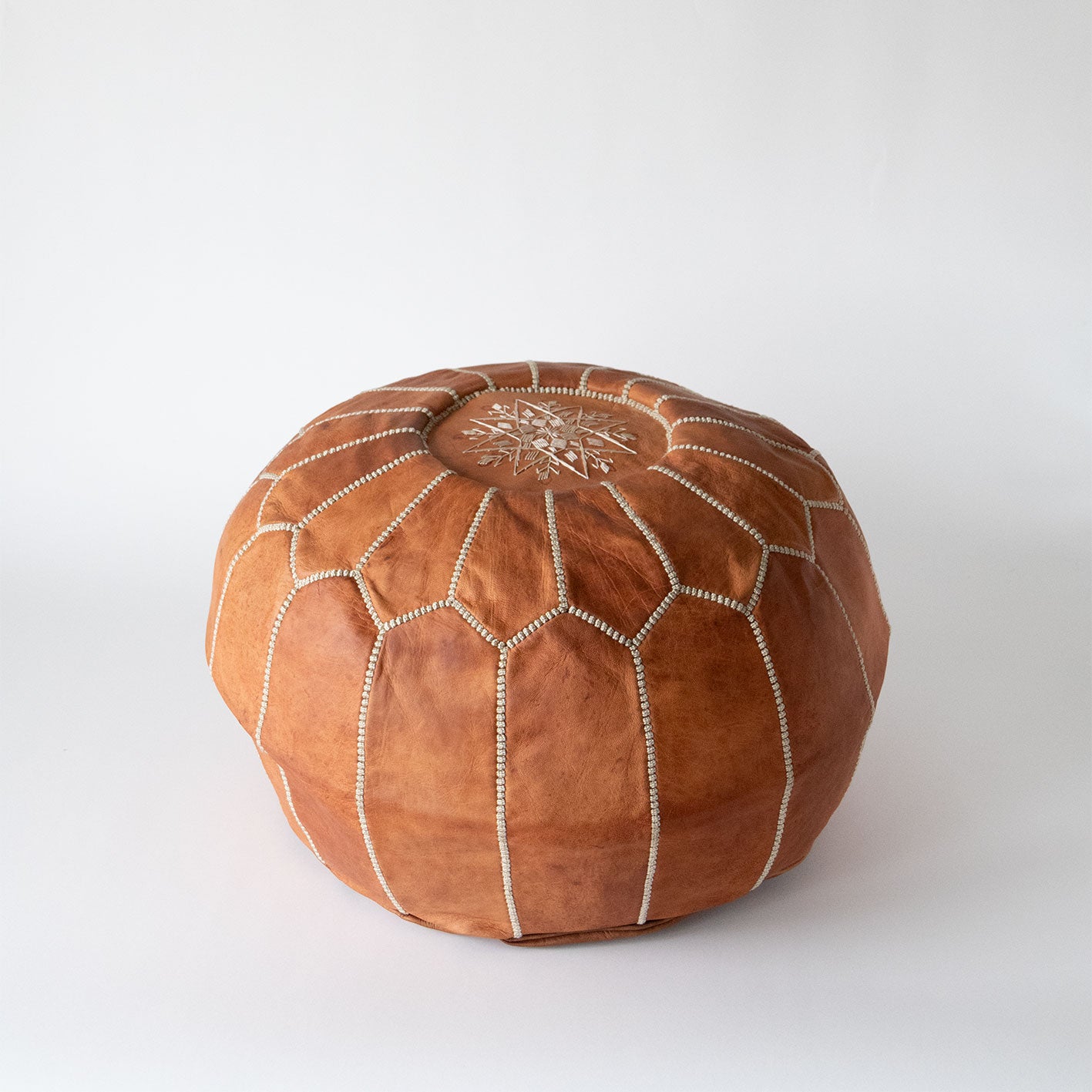 Marokkansk cognacbrun skinnpuff