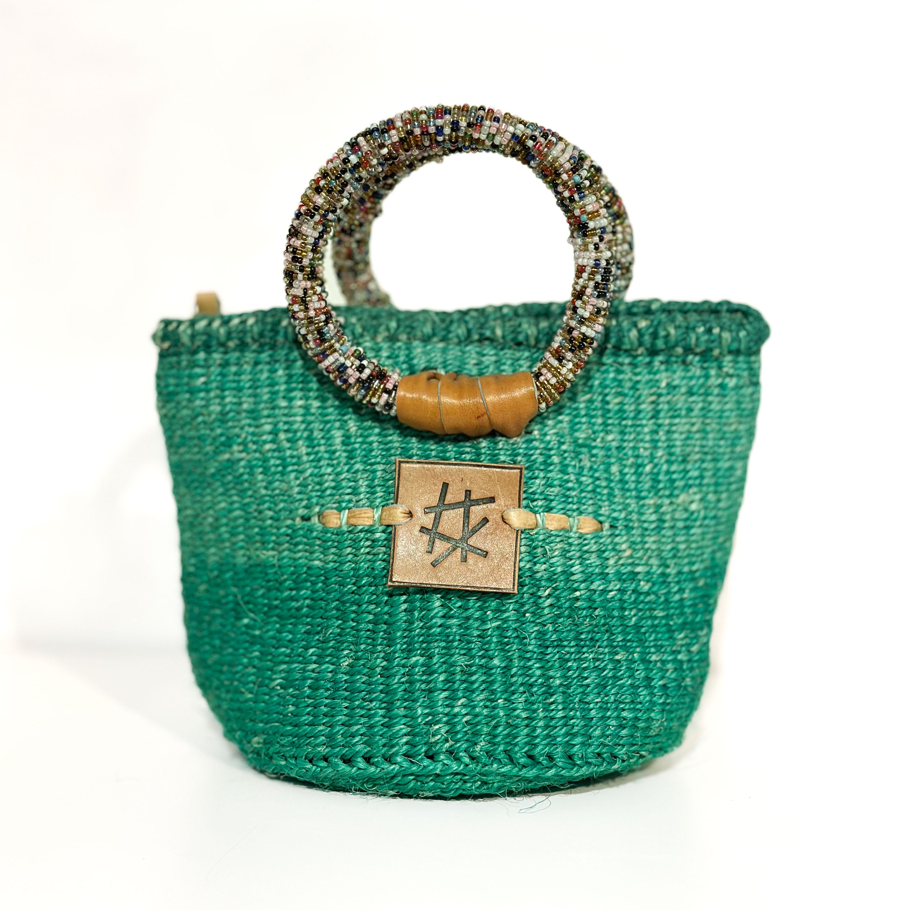 Liten veske med perlehåndtak