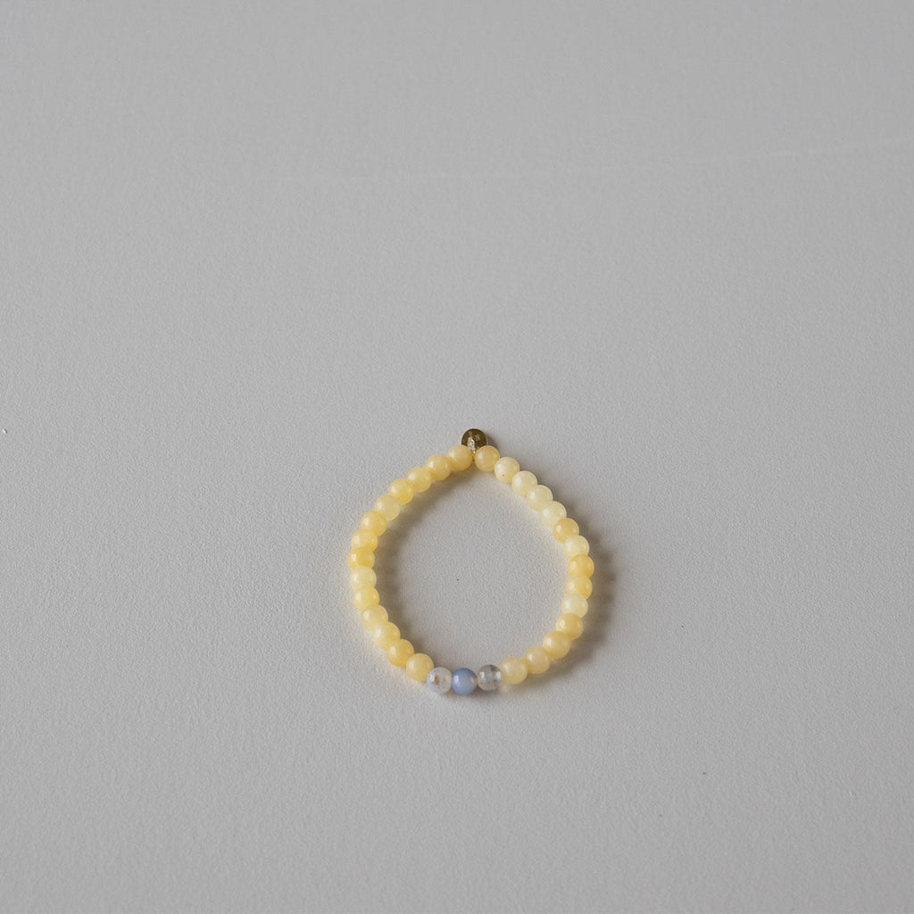 Armbånd med halvedelstener - Gul solsten og hvit månesten