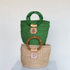 Liten veske med perlehåndtak